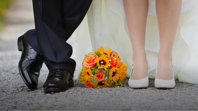 Photo of Couple's shows and flowers